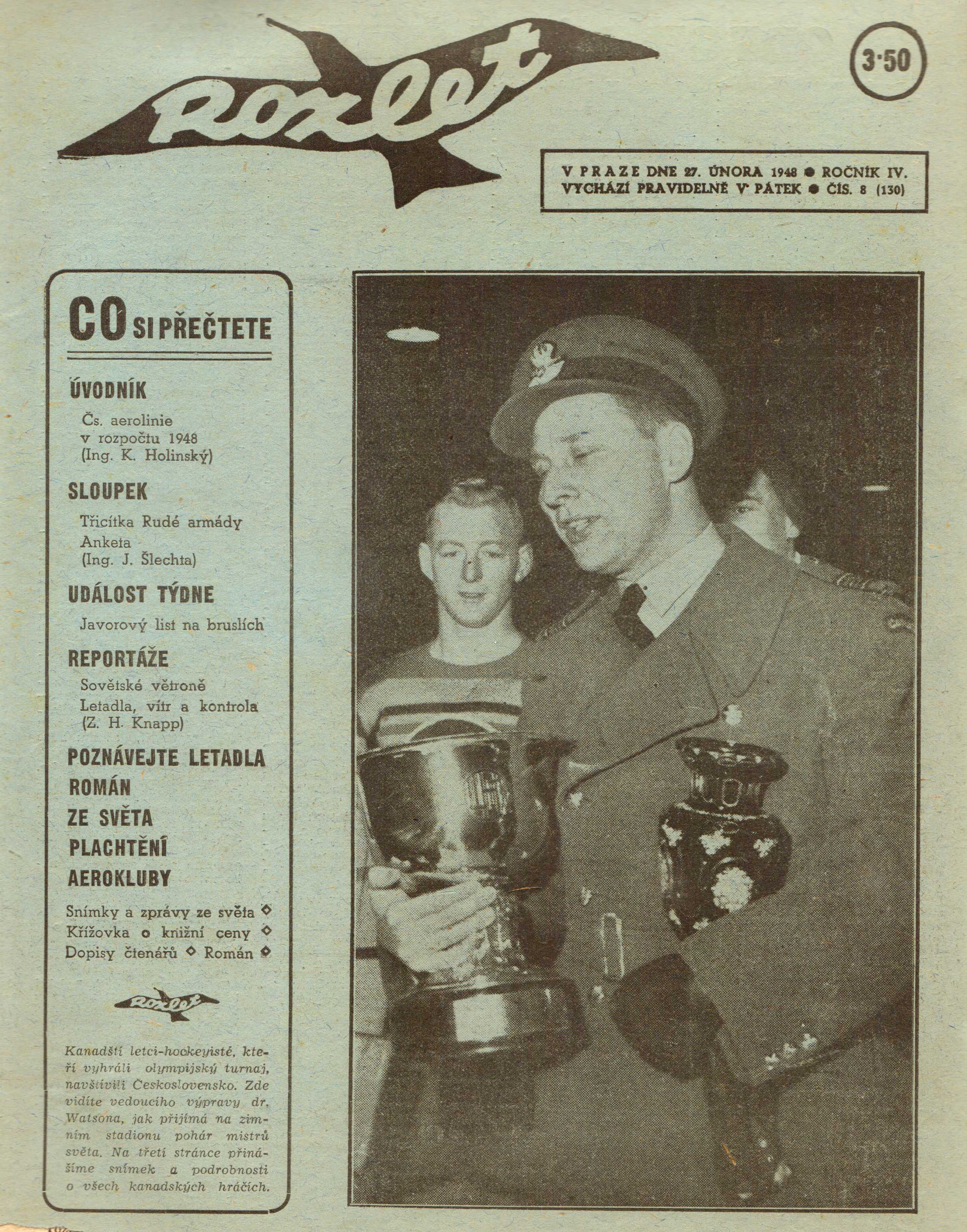Photo: Front Page of Czech newspaper Roxlet with S/L Sandy Watson holding Hockey World Cup